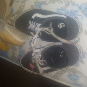 Vans with bleach stain